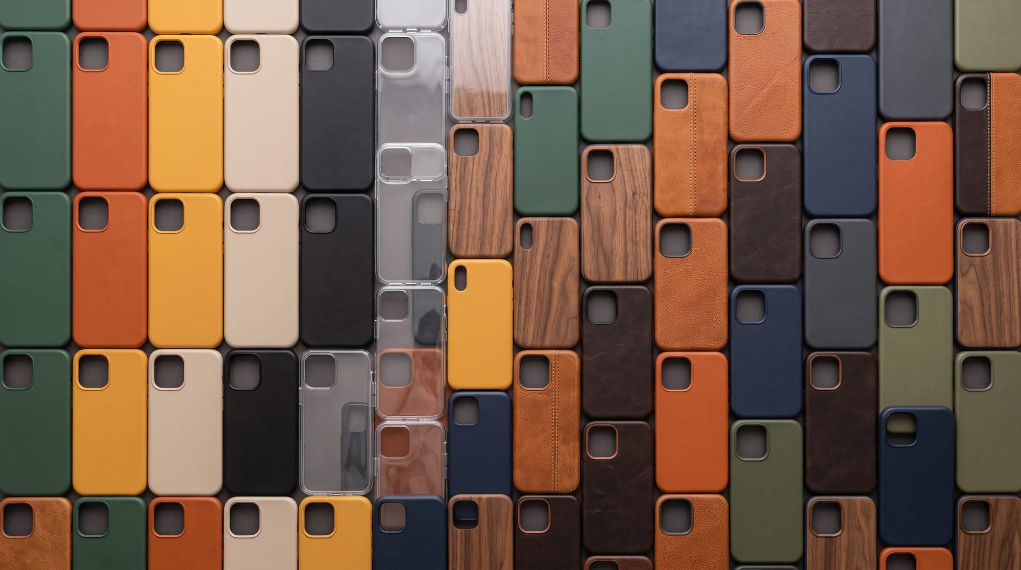 Phone back covers in a range of materials laid out in a grid